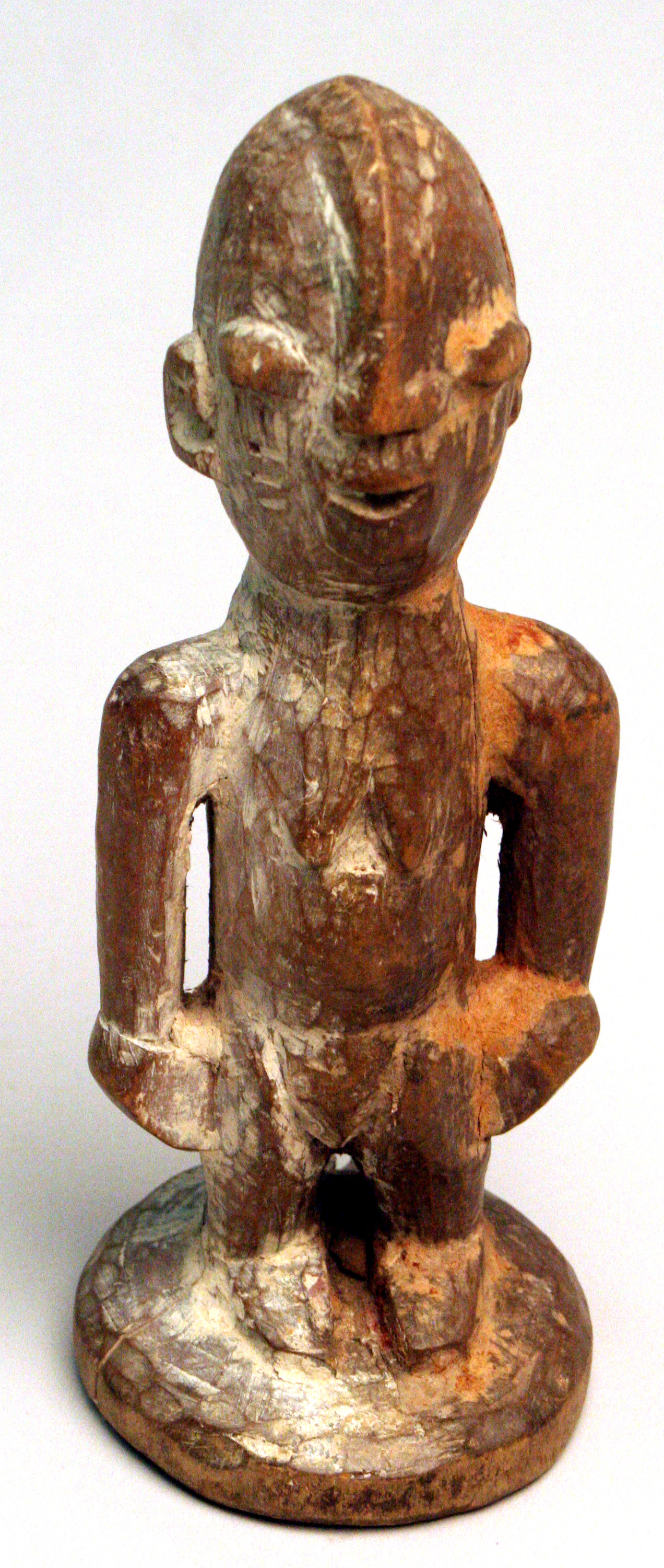 Carved ivory figure representing the Oba (traditional ruler) of Benin