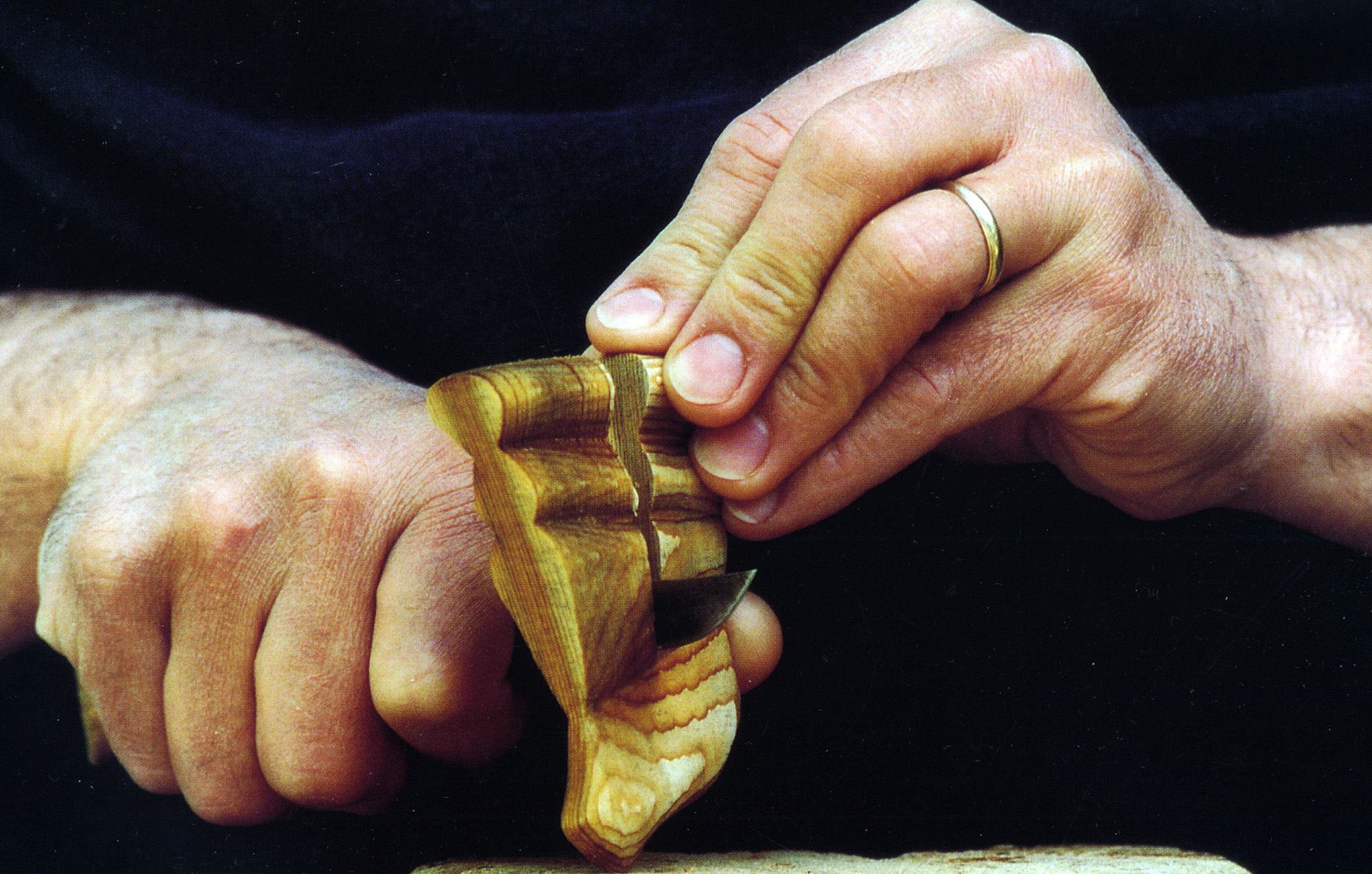 Glen VanAntwerp carving a cedar block