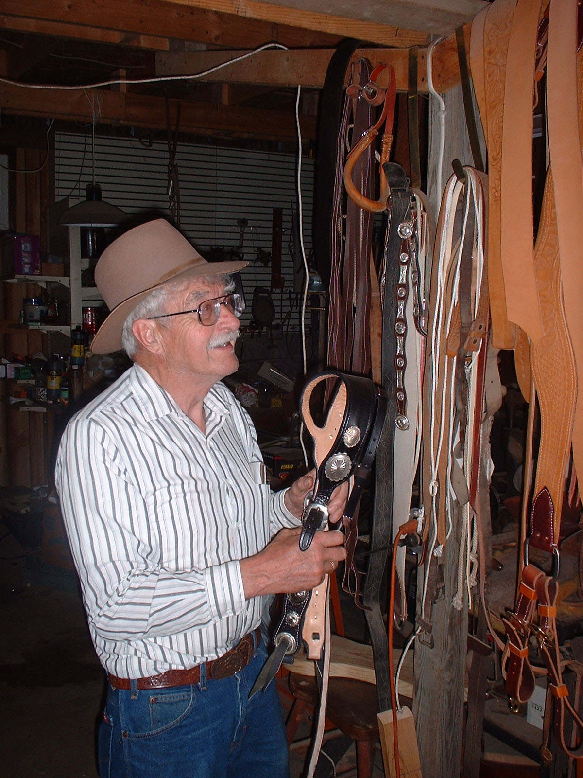 James Rice with various leather works