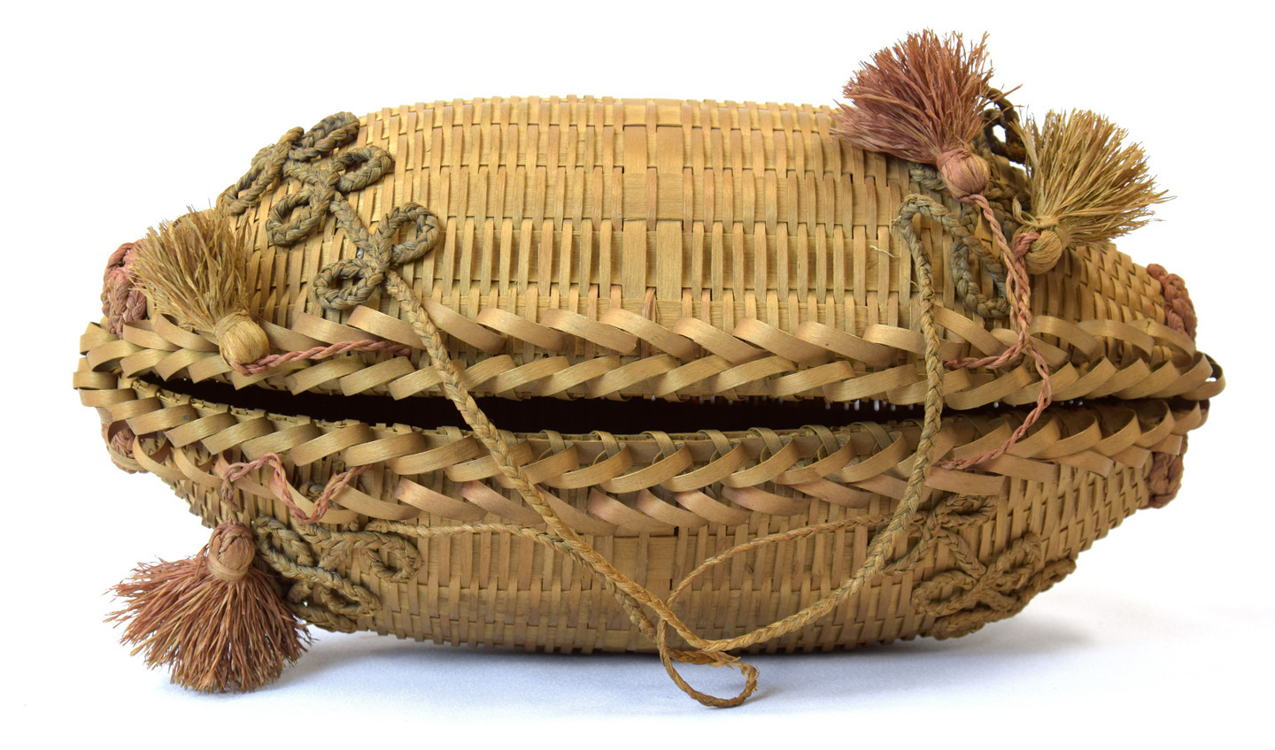 Victorian-era wrist purse, made by Michigan native basket wearers.